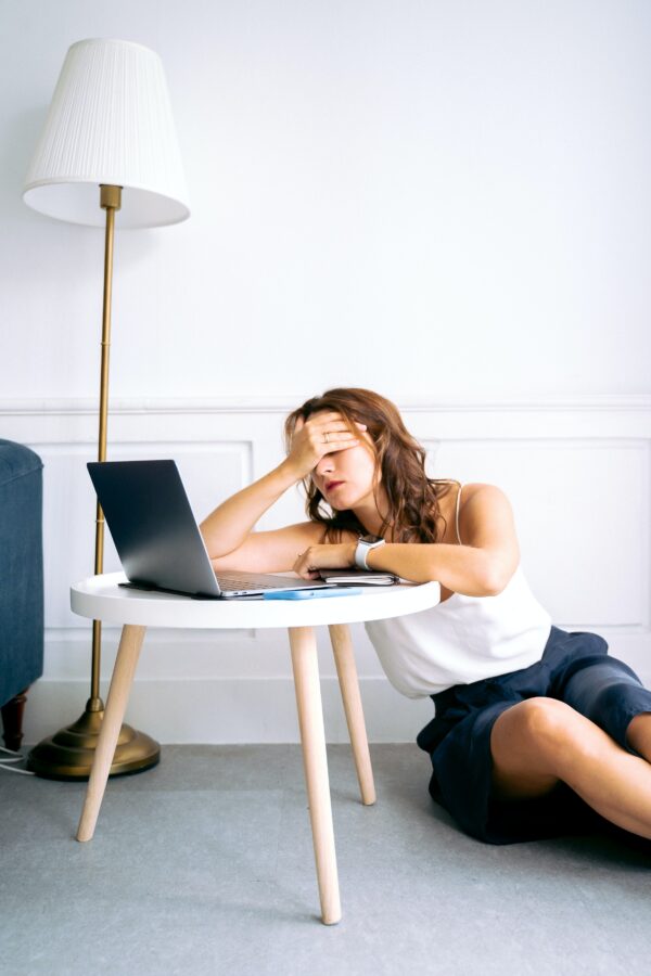 Frustrated Woman with a Laptop